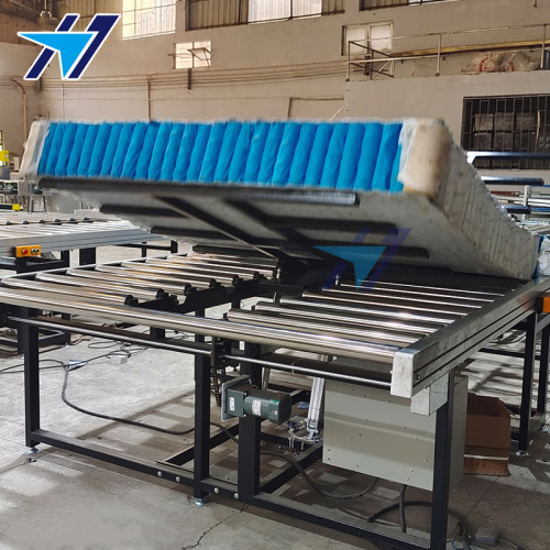 Mattress production flip conveyor line