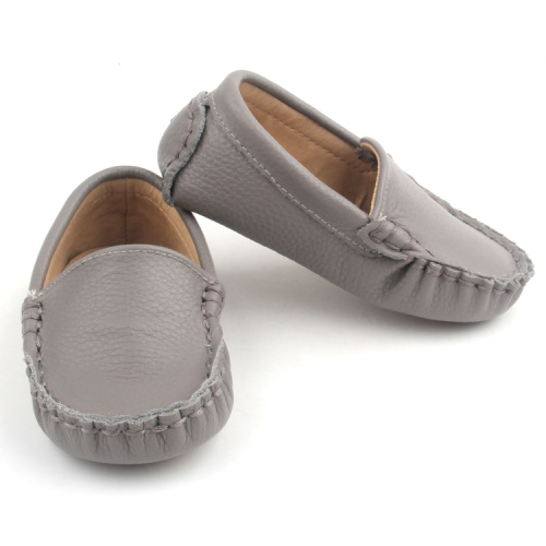 Zapatos casuales infantiles de cuero de suela blanda para bebé
