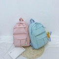 Beau sac à dos de sac à écoles en toile colorée
