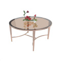 Brown stainless steel round coffee table