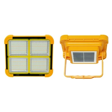 Portable solar camping light with handle