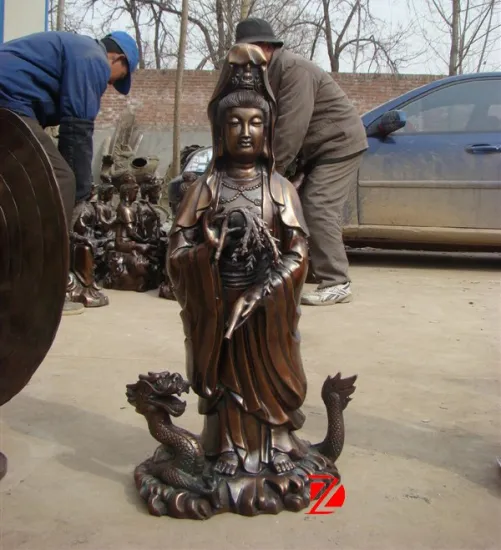 bronze kuan yin statue standing on dragon sculpture