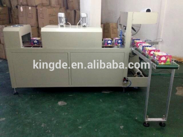 Fully automatic small shrink wrapping machine