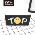 Estuche de lápices popular de TPU con estilo de cara de sonrisa superior