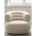 U-shaped sofa small white chair