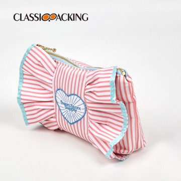 Benutzerdefinierte bestickte Logo Blue Lace Reißverschluss Rosa Striped Bogen Make -up -Tasche für Mädchen