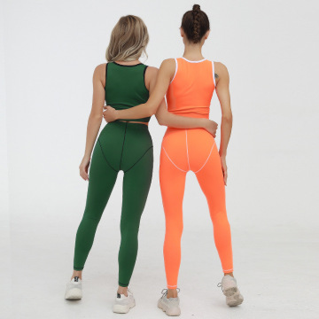 Tuta sportiva legging reggiseno con cerniera superiore