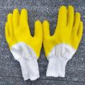 Guantes de látex de algodón amarillo con forro de muñeca de punto