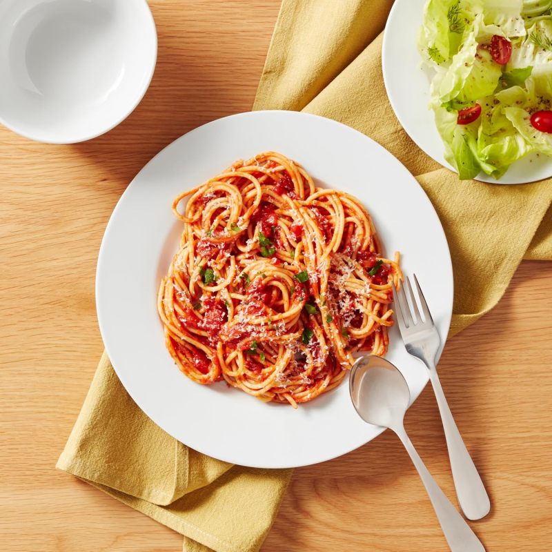 18 - Piece White Dinnerware Set, Including Plates and Bowls, for 6 People.