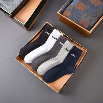 High Quality Unisex Solid White and Black Cotton Business Dress Socks with Knitted Techniques