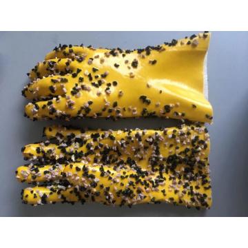 Luvas revestidas de pvc amarelo preto e branco.