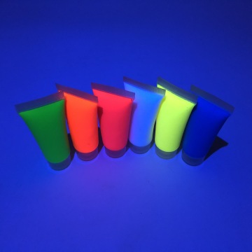 Ljus neon UV-kropps ansiktsfärg nattklubb