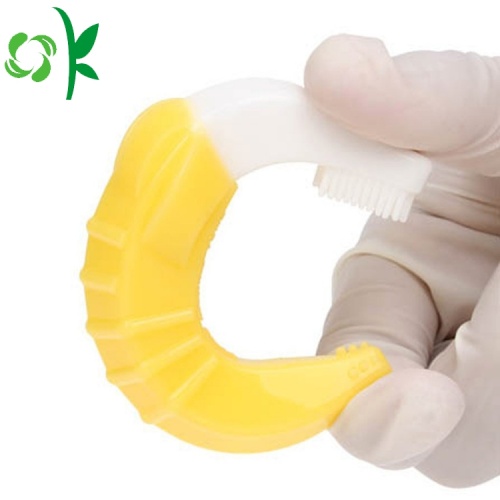 Líquido de limpeza amarelo macio da escova de dentes infantil do silicone para o dente