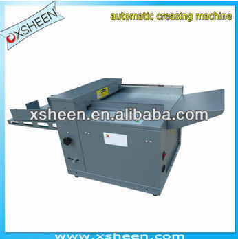 Auto paper creasing and perforating machine