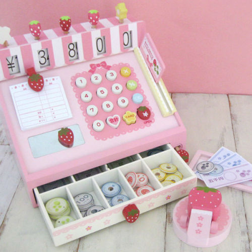 The wooden play toys cash register