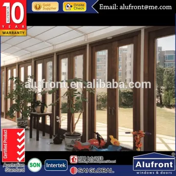 Europe standard aluminium clad wood composite folding door with root hardware