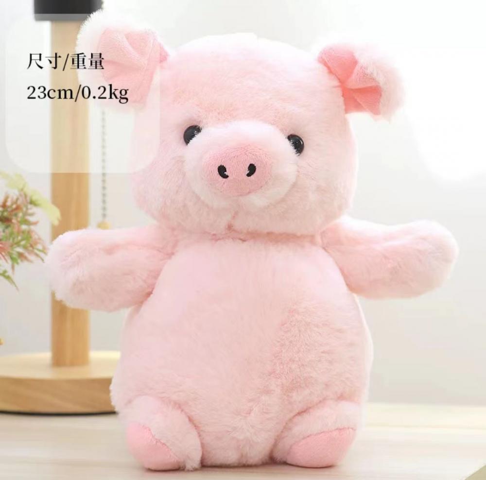 Un animal en peluche rose pote