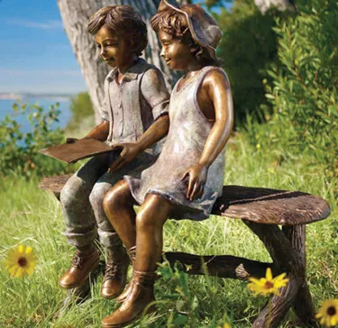 bronze casting foundry bronze statue two children sitting on a bench reading