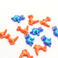 100 unids / lote Kawaii Cabujones de dinosaurio de resina Flatback Dino Cabs para el centro del arco del pelo Adorno DIY Accesorios para teléfono