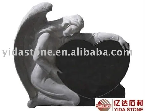 Angel with heart granite tombstone