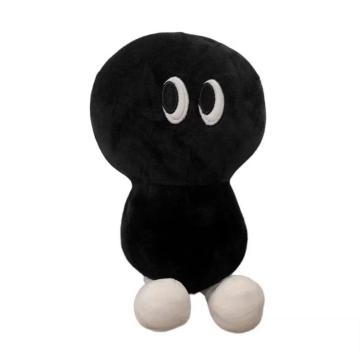 Petit animal en peluche noire de haricot noir