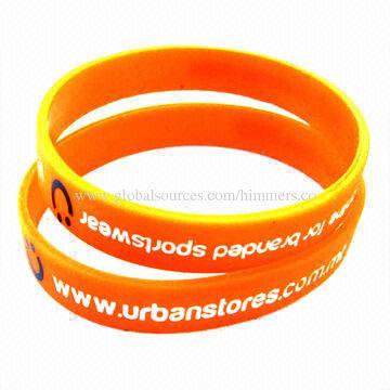 Debossed bracelets, made of silicone and rubber bands, laser engraved with color filled