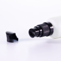 White glass lotion bottle with pump