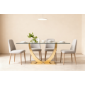 Mesa de comedor de vidrio con base de acero inoxidable dorado