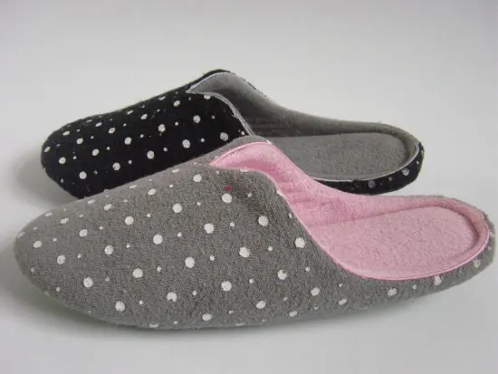 felt slippers of blue color with flower