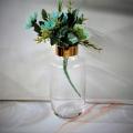 clear glass flower vase with gold rim