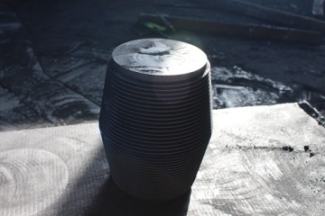 Le creuset en graphite isolé
