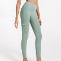 Legging Celana Yoga wanita bergaris dengan saku