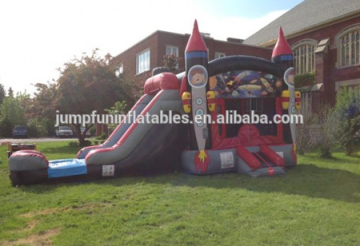 giant inflatable bounce house with rocket n slide pool