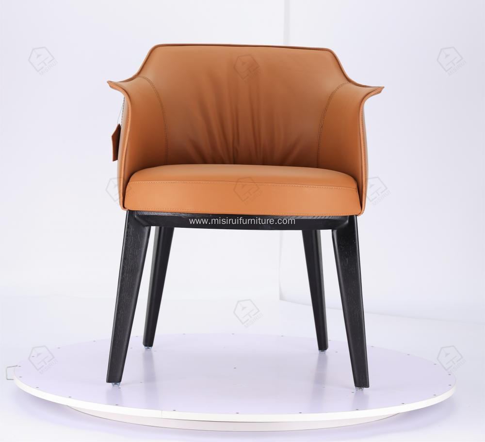 Italian minimalist orange leather single Archibald chairs