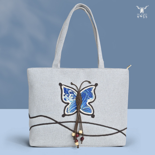 Elegante bolso de hombro de lino con mariposas coloridas para mujer