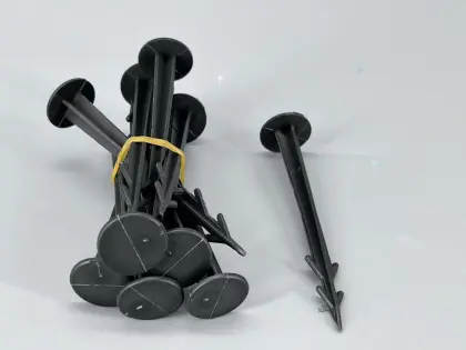 Plastic pegs to hold the woven mat