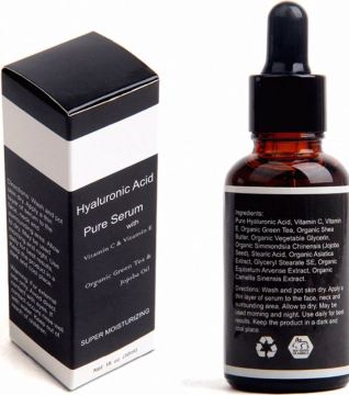 Sérum anti-âge d'huile de jojoba biologique avec acide hyaluronique et vitamine C
