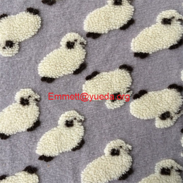 grey black natural white color running sheep jacqaurd design woolen fleece knit fabric.