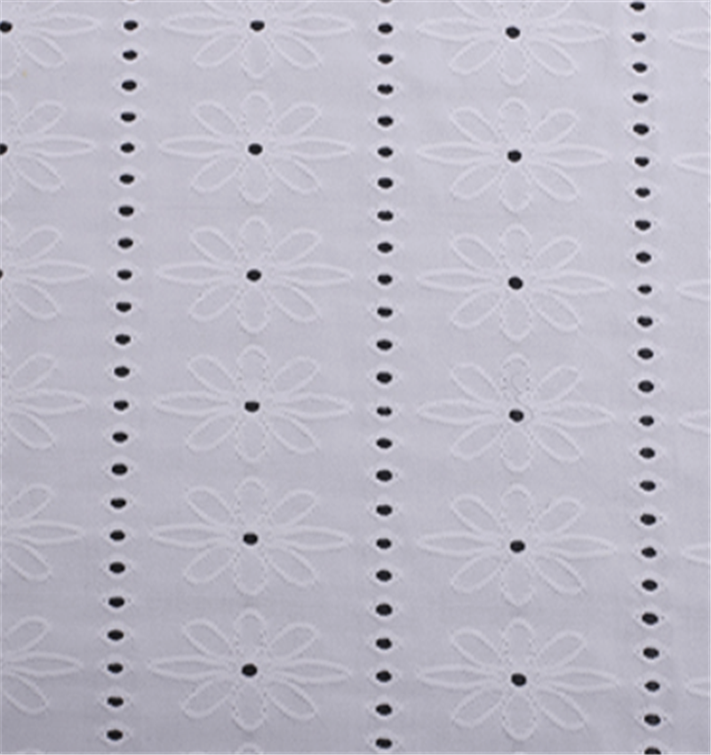 Embroidered knitted jacquard fabric.