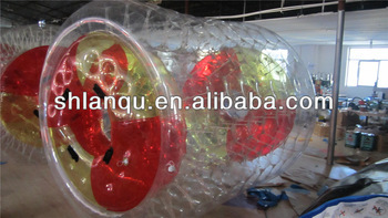 Cheap water park running games inflatable wheel roller for sale