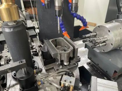 Multi-axis drilling and tapping machine