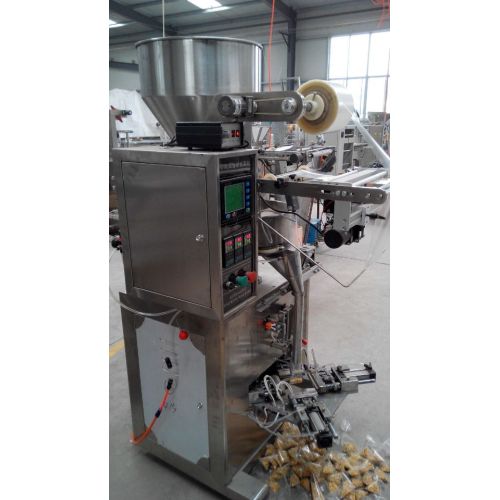 Small granule automatic triangle packing machine