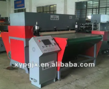 Conveyor feeding hydraulic plastic bag making machine