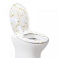 White Duroplast Toilet Seats in Gold-Dust Glitter Effect