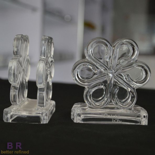 Serviettenhalter aus klarem Glas in Blumenform