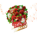 Tarjeta emergente musical con ramo de Navidad