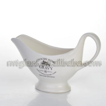 Ceramic gravy boat shaped with handle ceramic condiment set