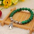 Bracelet en malachite naturelle avec pendentifs en alliage