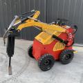 O Mini Skid Steer Loader aprovado pela EPA com anexos