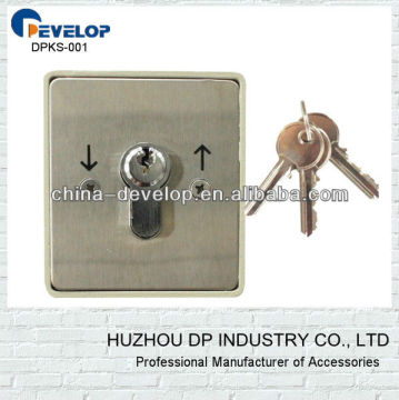 Garage door shutter key selector for central motor